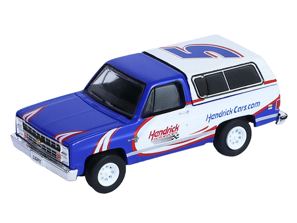 1986 Chevrolet K5 Blazer Blue and White and 1969 Chevrolet Camaro #5 Blue and White "Kyle Larson - Hendrick Motorsports" with Tandem Car Trailer "Racing Hitch & Tow" Series 6 1/64 Diecast Model Cars