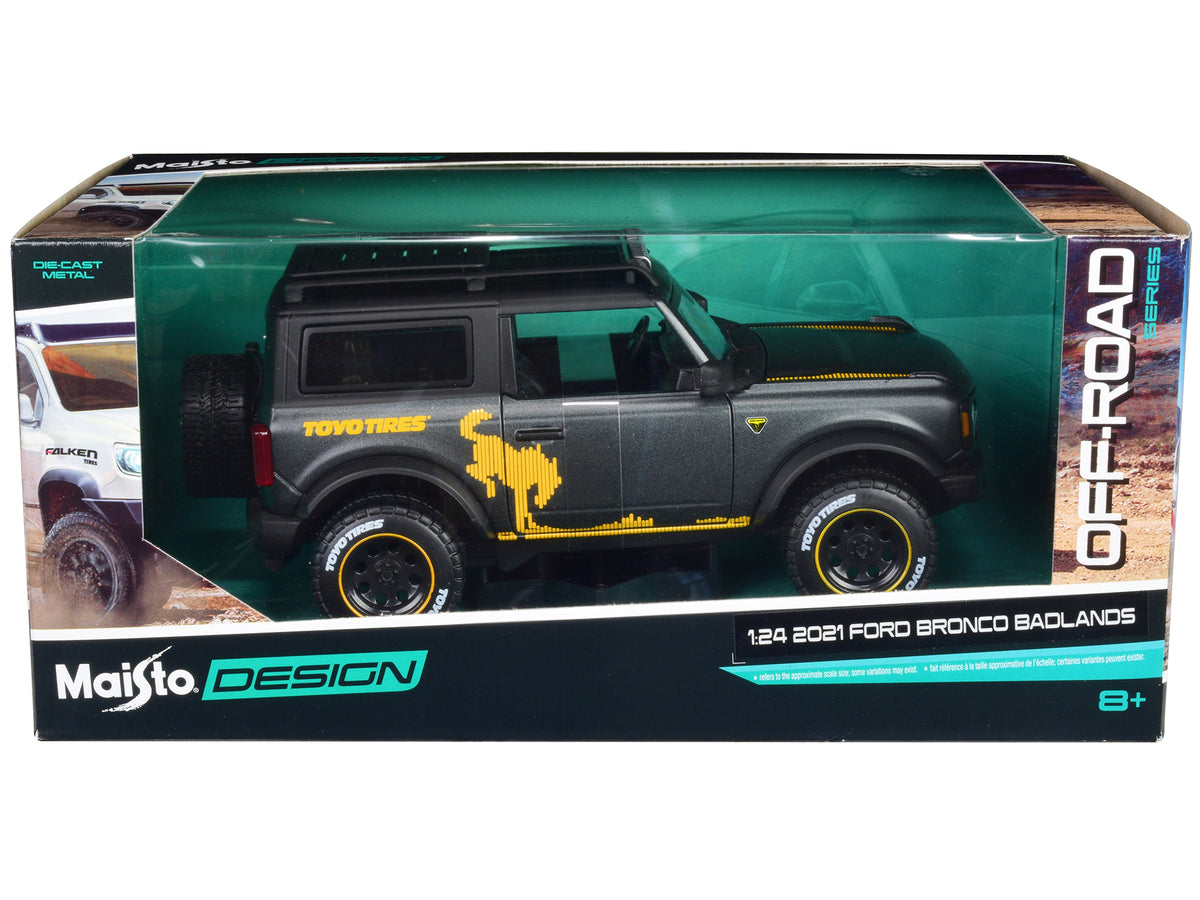 2021 Ford Bronco Badlands Dark Gray Metallic with Gold Graphics and Roof Rack "Off-Road" "Maisto Design" Series 1/24 Diecast Model Car