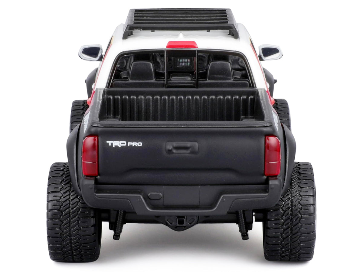 2023 Toyota Tacoma TRD PRO Off Road Pickup Truck White with Graphics and Roof Rack "Maisto Design" Series 1/27 Diecast Model Car Maisto