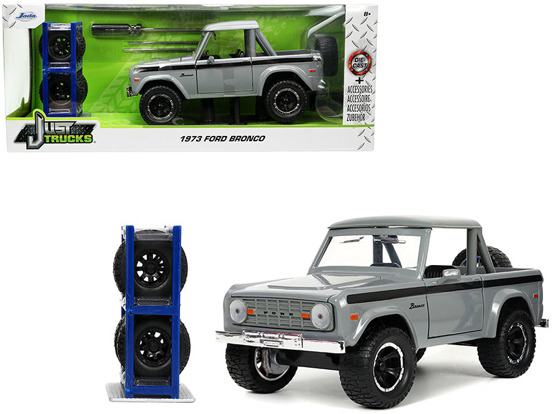 1973 Ford Bronco Pickup Truck Gray with Black Stripes with Extra Wheels "Just Trucks" Series 1/24 Diecast Model Car