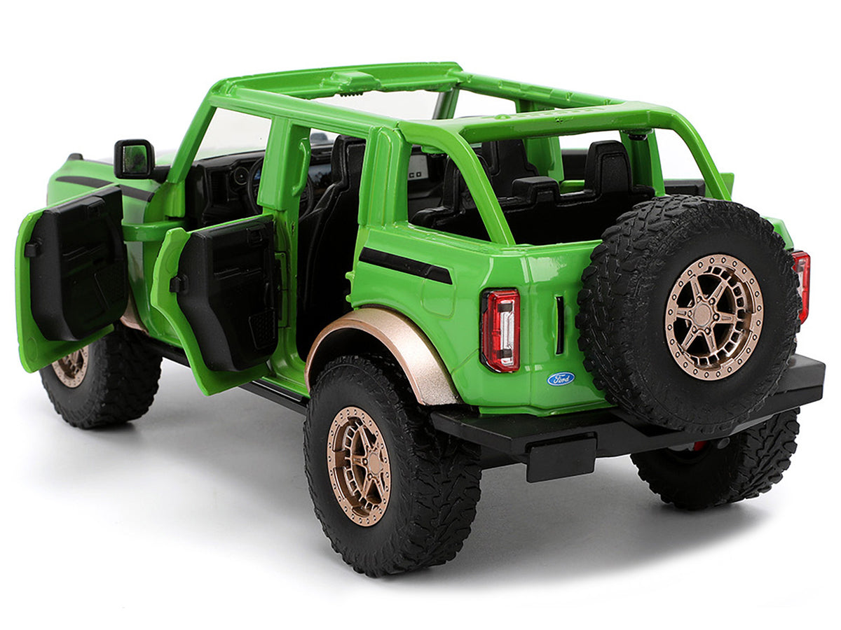 2021 Ford Bronco Green with Black Stripes and Green M&M's Diecast Figure "Hollywood Rides" Series 1/24 Diecast Model Car