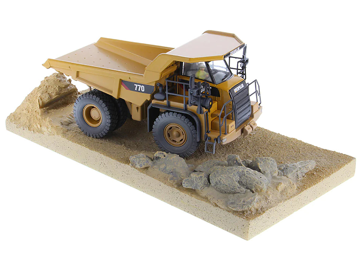 CAT Caterpillar 770 Off-Highway Truck Yellow (Weathered) with Operator "Weathered" Series 1/50 Diecast Model