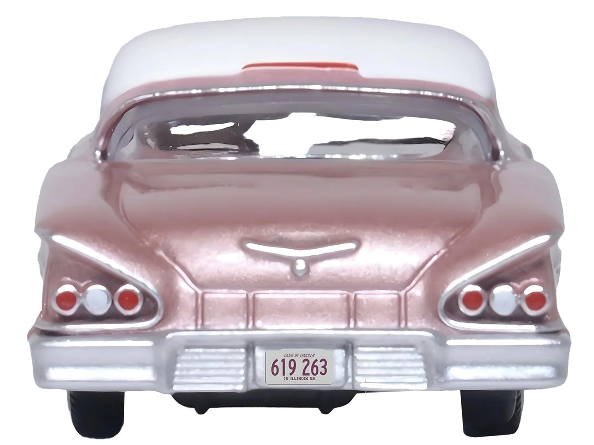 1958 Chevrolet Impala Sport Cay Coral Pink Metallic with White Top 1/87 (HO) Scale Diecast Model Car