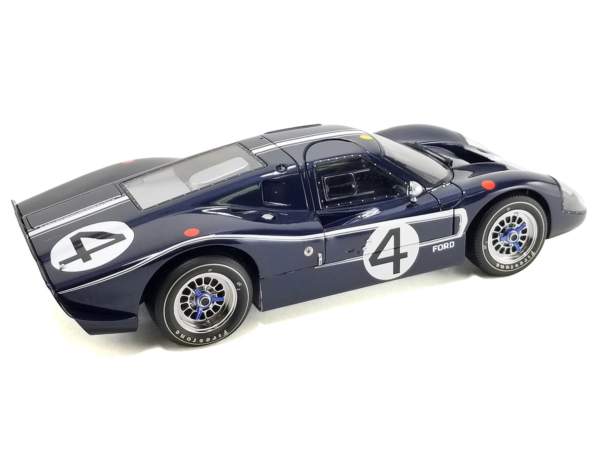 Ford GT40 MKIV #4 Denny Hulme - Lloyd Ruby "Holman & Moody" "24 Hours of Le Mans" (1967) "Masterpiece Collection" 1/12 Diecast Model Car