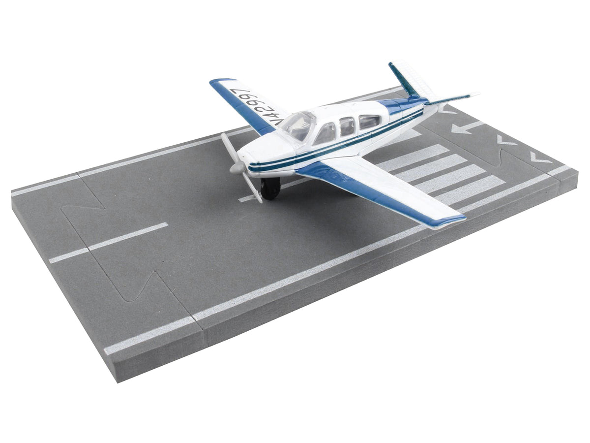 Beechcraft Bonanza Aircraft White with Blue Stripes "N42997" with Runway Section Diecast Model Airplane