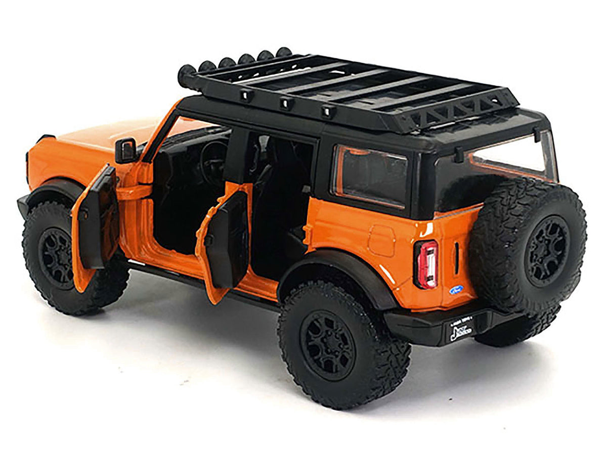 2021 Ford Bronco Orange with Black Stripes and Roof Rack "Just Trucks" Series 1/24 Diecast Model Car