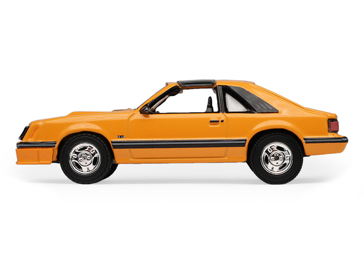 1982 Ford Foxbody Mustang Medium Vanilla Yellow with Black Top "The Mustang Stampede" Series 2 1/64 Diecast Model Car