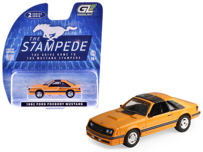 1982 Ford Foxbody Mustang Medium Vanilla Yellow with Black Top "The Mustang Stampede" Series 2 1/64 Diecast Model Car