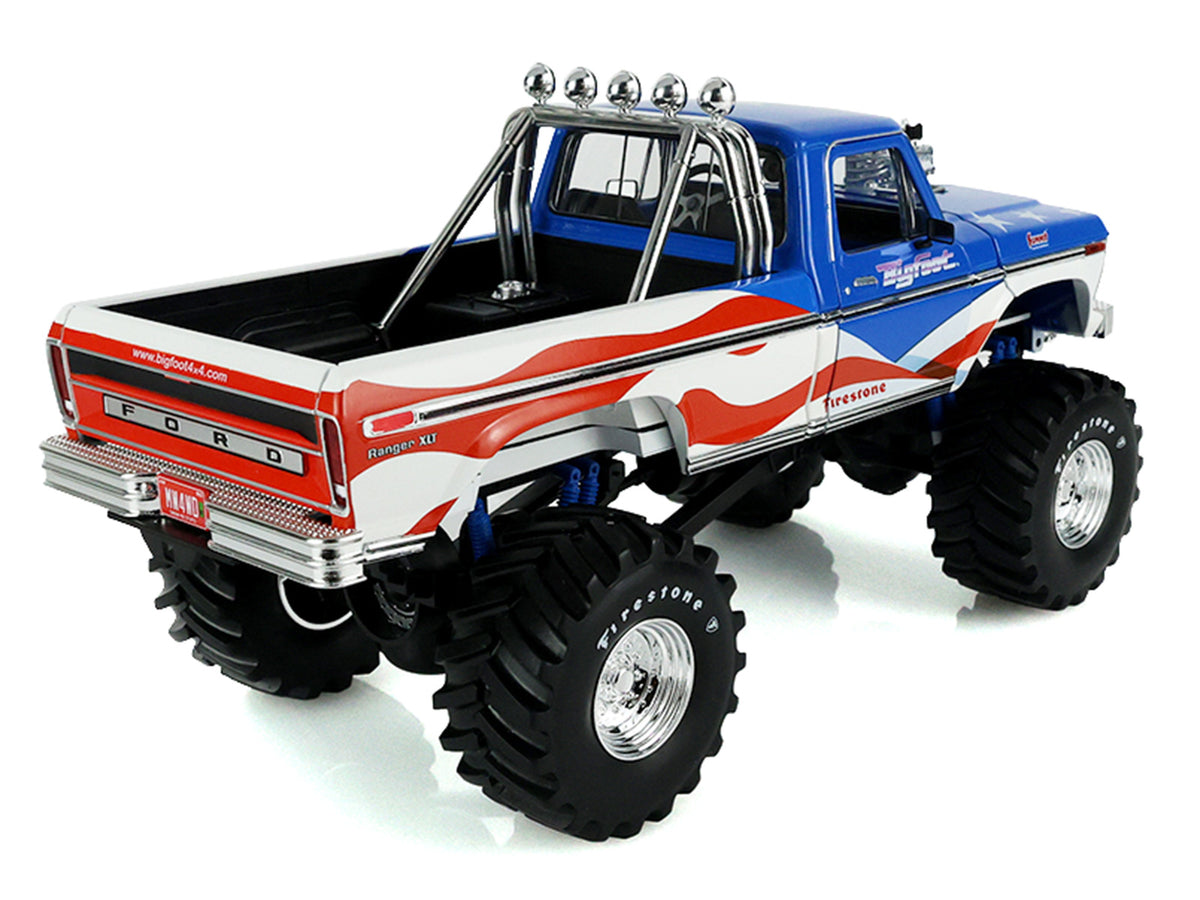 1979 Ford F-250 Monster Truck "Bigfoot USA 250 Tribute" Blue with USA Flag Graphics and Bob Chandler Standing Figure "Kings of Crunch" Series 1/18 Diecast Model Car