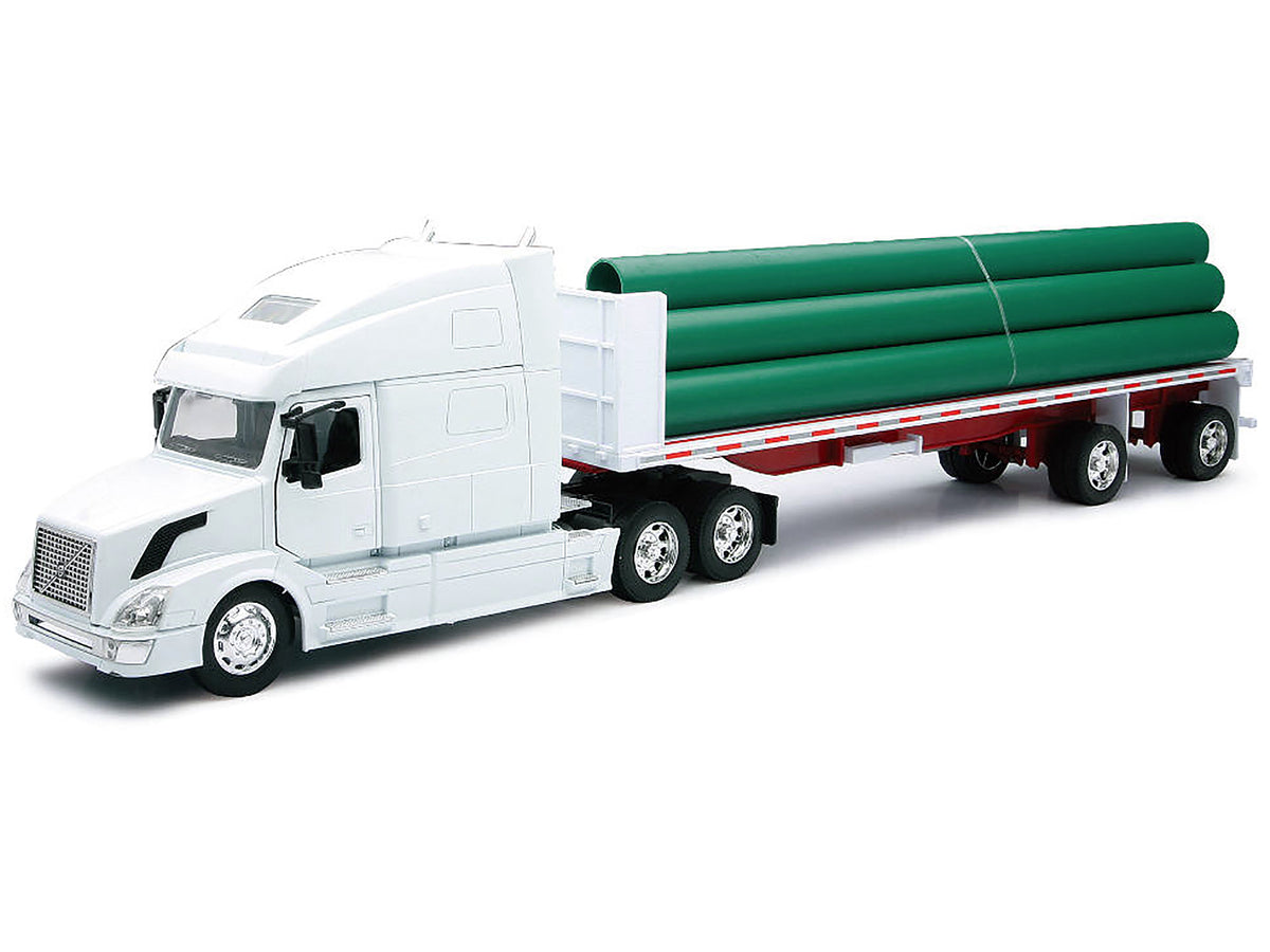 Volvo VN-780 Truck with Flatbed Trailer and Long Pipes White "Long Haul Truckers" Series 1/32 Diecast Model