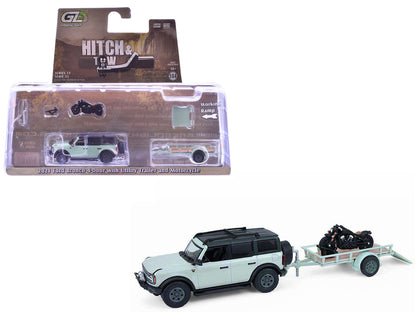 2021 Ford Bronco 4-Door Badlands Cactus Gray with Black Top and Motorcycle with Utility Trailer "Hitch & Tow" Series 33 1/64 Diecast Model Cars