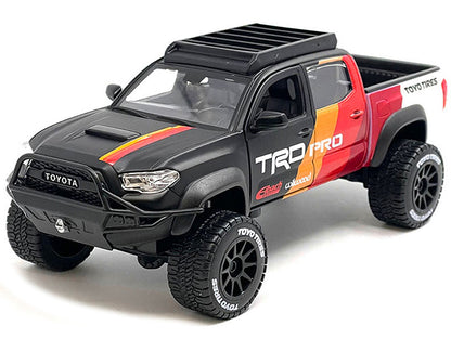 2023 Toyota Tacoma TRD PRO Off Road Pickup Truck Matt Black with Graphics and Roofrack "Maisto Design" Series 1/27 Diecast Model Car