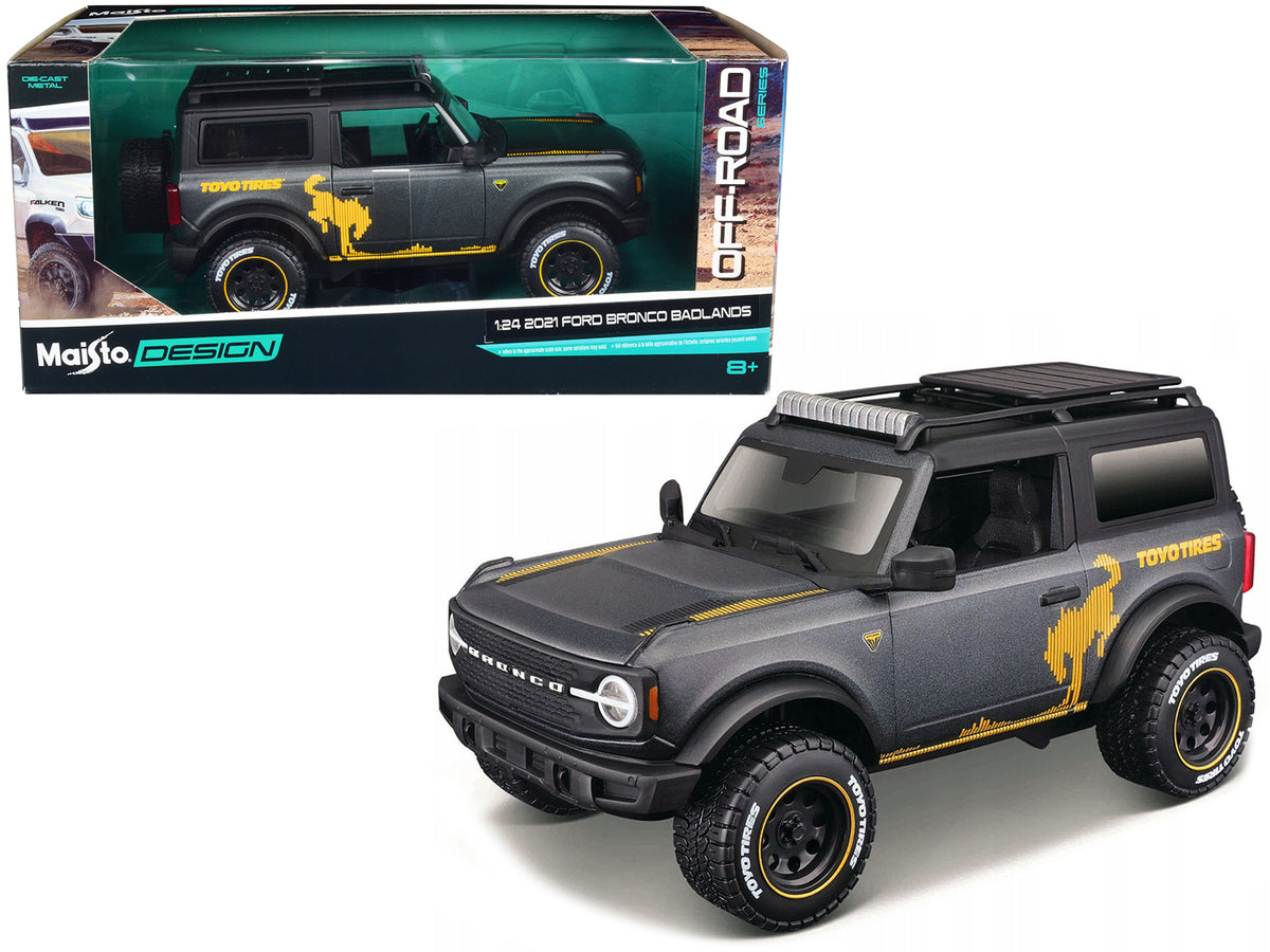 2021 Ford Bronco Badlands Dark Gray Metallic with Gold Graphics and Roof Rack "Off-Road" "Maisto Design" Series 1/24 Diecast Model Car