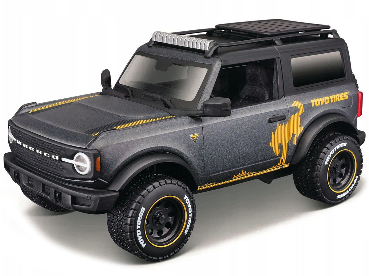 2021 Ford Bronco Badlands Dark Gray Metallic with Gold Graphics and Roof Rack "Off-Road" "Maisto Design" Series 1/24 Diecast Model Car
