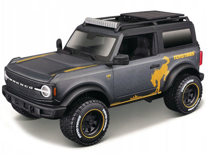 2021 Ford Bronco Badlands Dark Gray Metallic with Gold Graphics and Roof Rack "Off-Road" "Maisto Design" Series 1/24 Diecast Model Car
