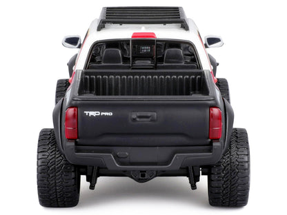 2023 Toyota Tacoma TRD PRO Off Road Pickup Truck White with Graphics and Roof Rack "Maisto Design" Series 1/27 Diecast Model Car Maisto