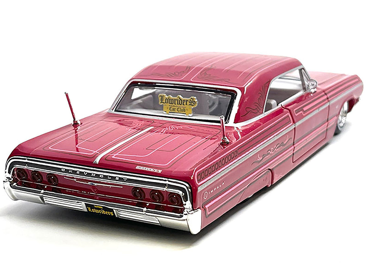1964 Chevrolet Impala SS Lowrider Pink with Graphics and White Interior "Lowriders" "Maisto Design" Series 1/26 Diecast Model Car