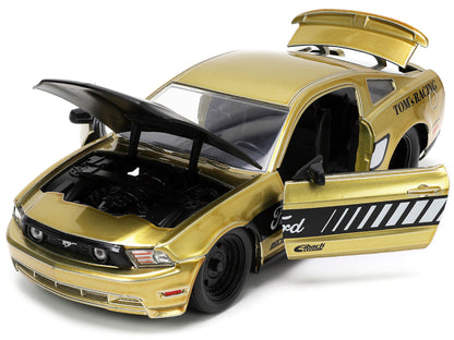 2010 Ford Mustang GT Gold Metallic with Black Graphics and Hood "Tom's Racing" "Bigtime Muscle" Series 1/24 Diecast Model Car
