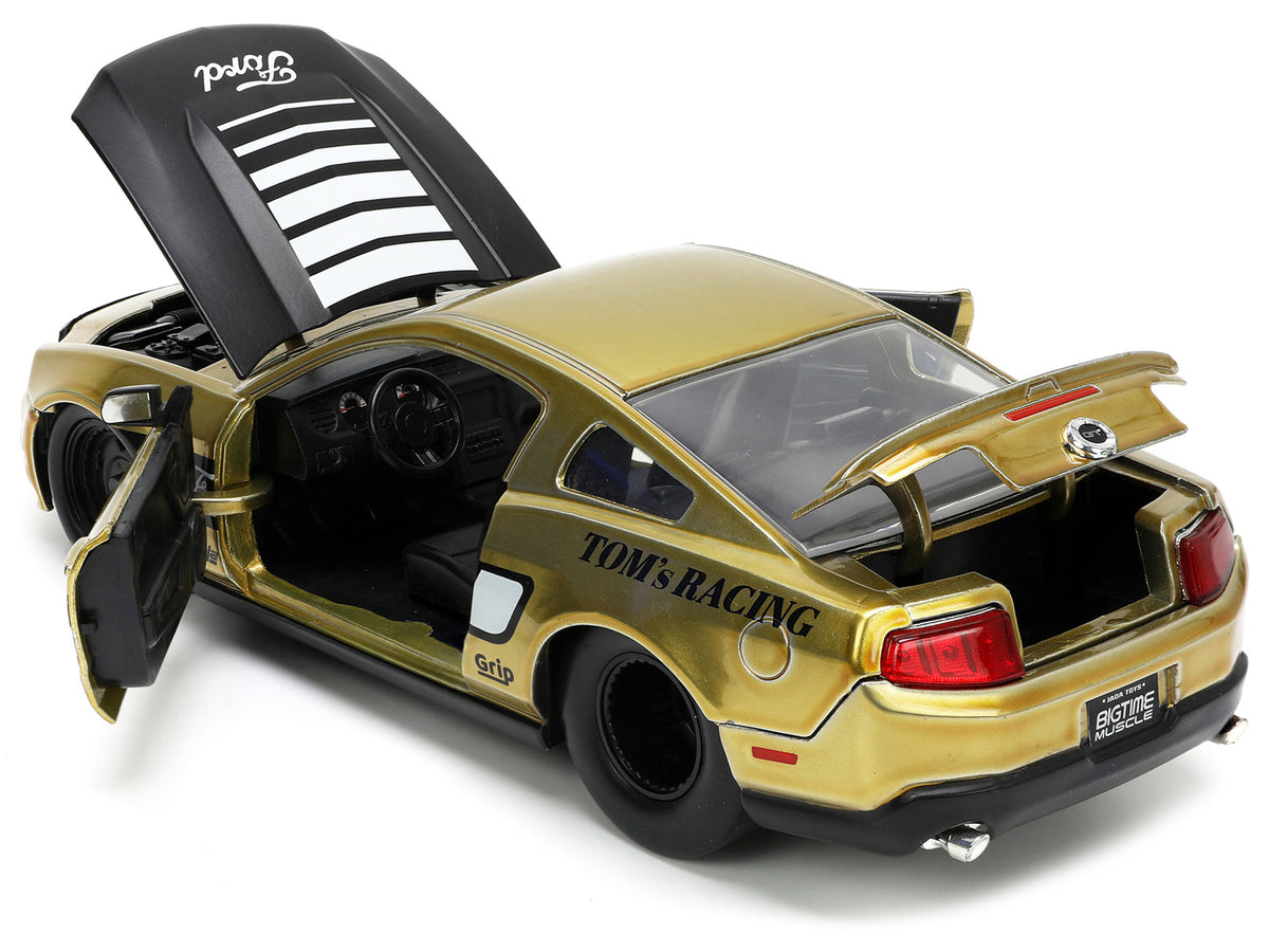 2010 Ford Mustang GT Gold Metallic with Black Graphics and Hood "Tom's Racing" "Bigtime Muscle" Series 1/24 Diecast Model Car