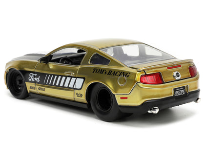 2010 Ford Mustang GT Gold Metallic with Black Graphics and Hood "Tom's Racing" "Bigtime Muscle" Series 1/24 Diecast Model Car