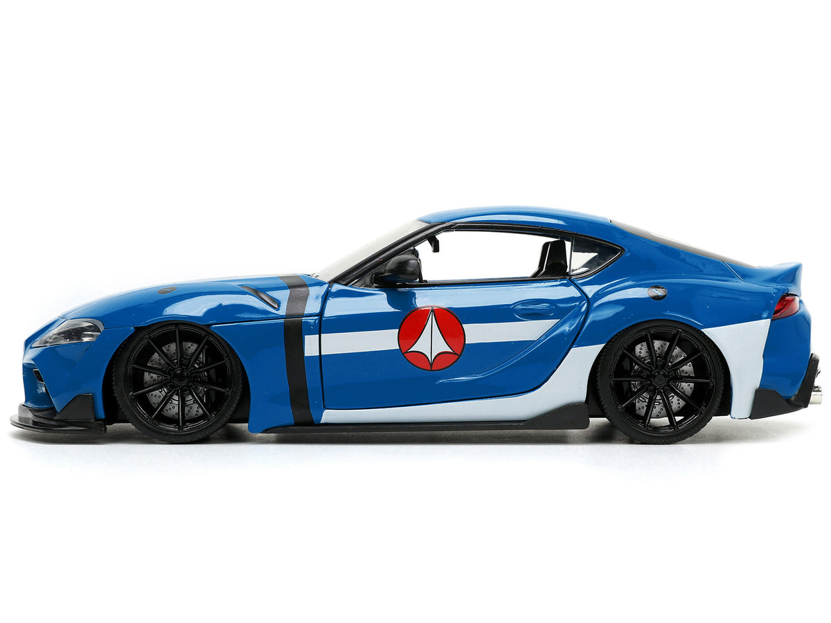 2020 Toyota Supra Blue with Graphics and Max Sterling Diecast Figurine "Robotech" "Hollywood Rides" Series 1/24 Diecast Model Car