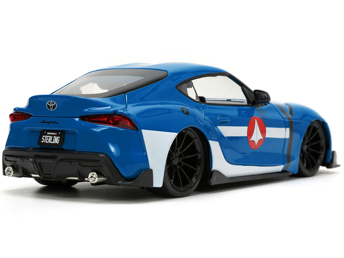 2020 Toyota Supra Blue with Graphics and Max Sterling Diecast Figurine "Robotech" "Hollywood Rides" Series 1/24 Diecast Model Car