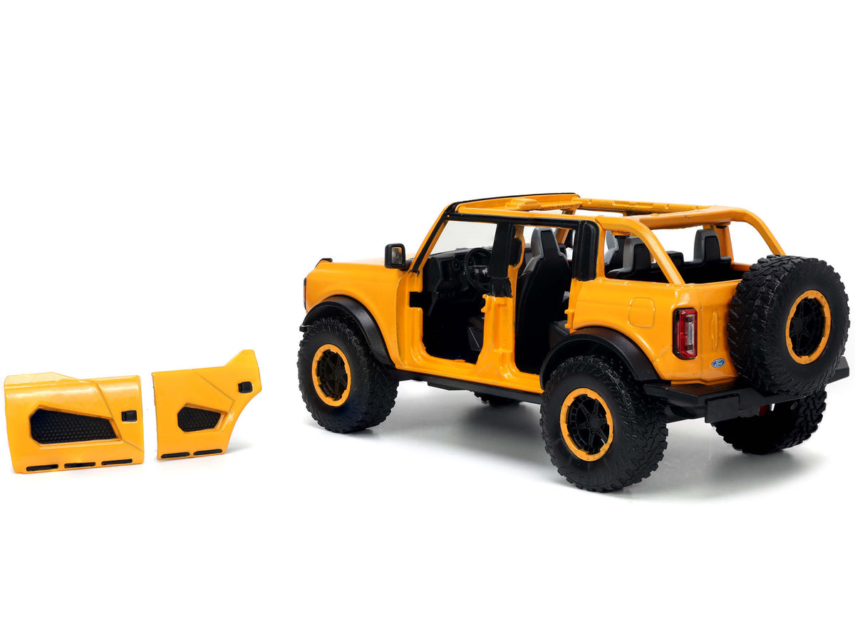 2021 Ford Bronco Orange Metallic with Extra Wheels "Just Trucks" Series 1/24 Diecast Model Car