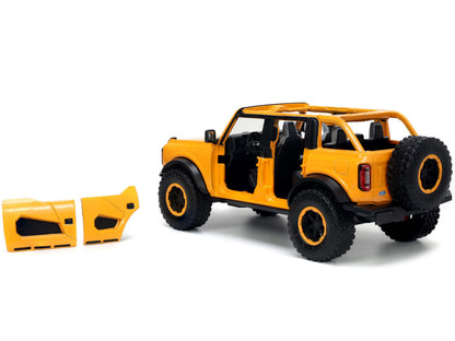 2021 Ford Bronco Orange Metallic with Extra Wheels "Just Trucks" Series 1/24 Diecast Model Car