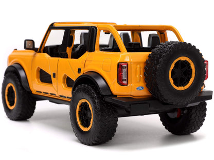 2021 Ford Bronco Orange Metallic with Extra Wheels "Just Trucks" Series 1/24 Diecast Model Car