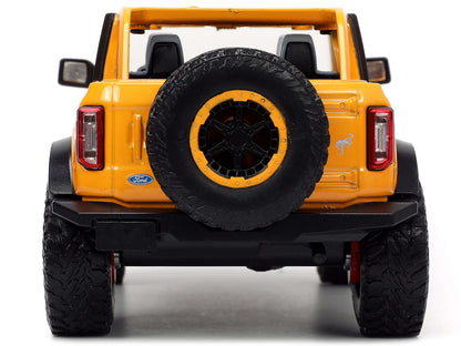 2021 Ford Bronco Orange Metallic with Extra Wheels "Just Trucks" Series 1/24 Diecast Model Car