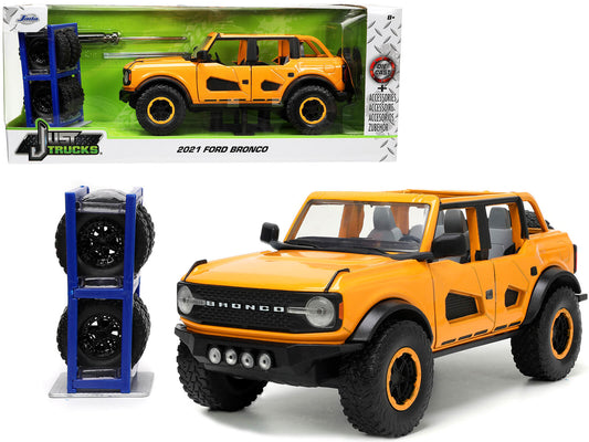 2021 Ford Bronco Orange Metallic with Extra Wheels "Just Trucks" Series 1/24 Diecast Model Car