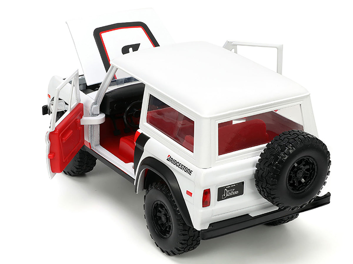 1973 Ford Bronco #008 White with Red and Black Stripes and Red Interior with Extra Wheels "Just Trucks" Series 1/24 Diecast Model Car