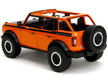 2021 Ford Bronco Open-Top Orange with Black Stripes and Hood with Extra Wheels "Just Trucks" Series 1/24 Diecast Model Car