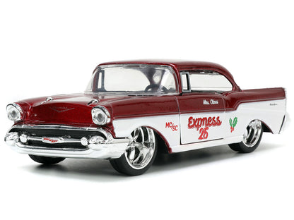 1941 Ford Pickup Truck Red and White "Santa's Workshop" and 1957 Chevrolet Bel Air Red Metallic and White "Express 25" with Mr. and Mrs. Santa Claus Diecast Figures "Holiday Rides" Series 1/32 Diecast Model Cars