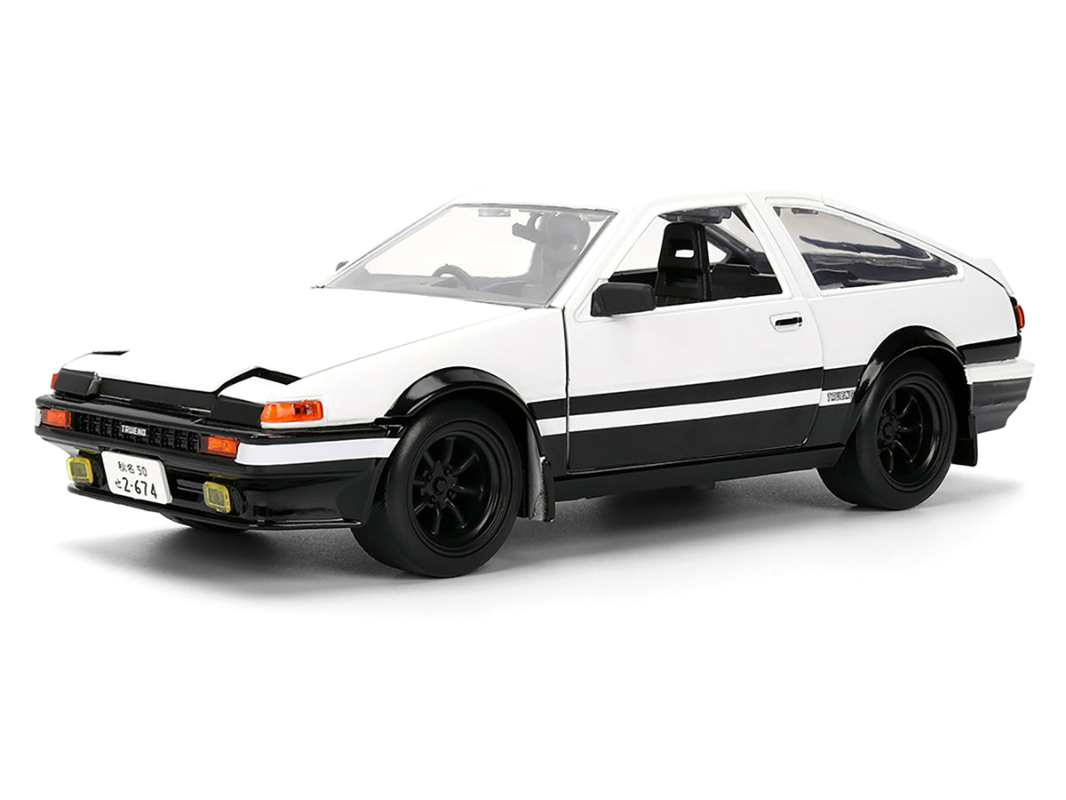 Toyota Trueno (AE86) RHD (Right Hand Drive) White and Black with Graphics and Takumi Diecast Figure "Initial D" (1998-2021) TV Series "Anime Hollywood Rides" Series 1/24 Diecast Model