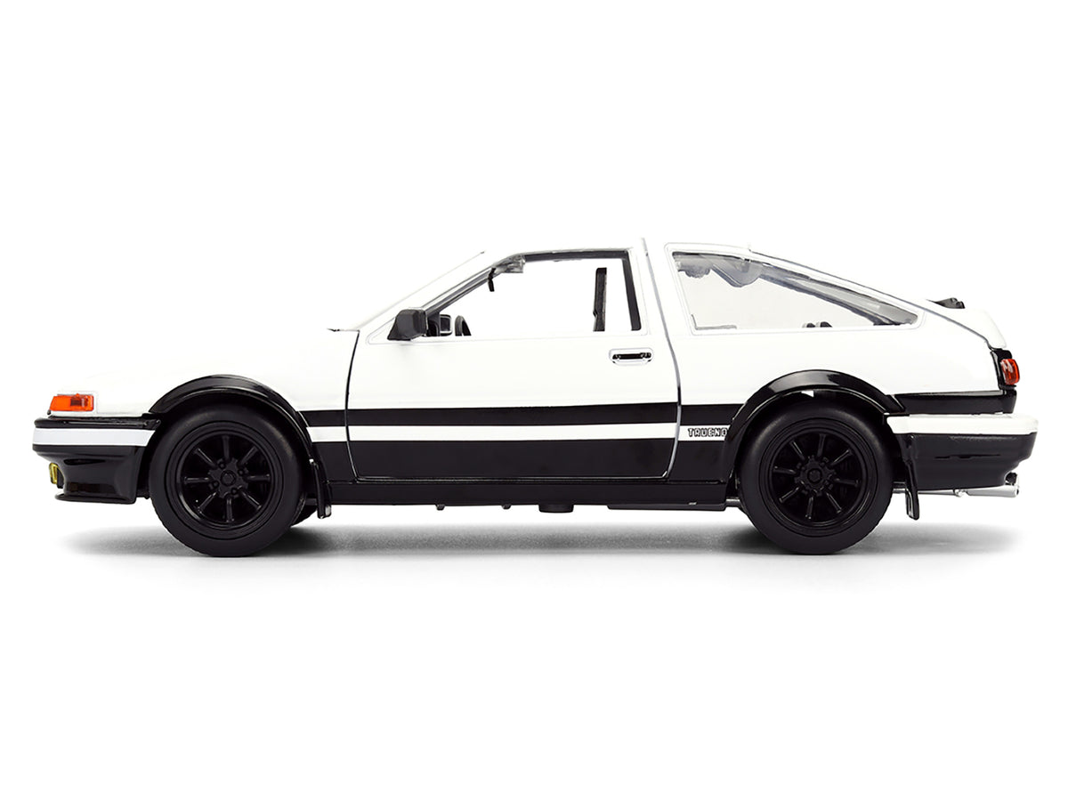 Toyota Trueno (AE86) RHD (Right Hand Drive) White and Black with Graphics and Takumi Diecast Figure "Initial D" (1998-2021) TV Series "Anime Hollywood Rides" Series 1/24 Diecast Model