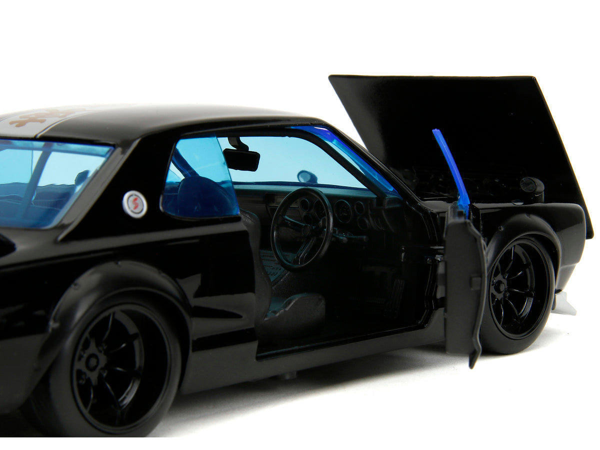 1971 Nissan Skyline GT-R RHD (Right Hand Drive) Black with Silver Stripe and Mikey Diecast Figure "Tokyo Revengers" (2021) TV Series "Anime Hollywood Rides" Series 1/24 Diecast Model Car
