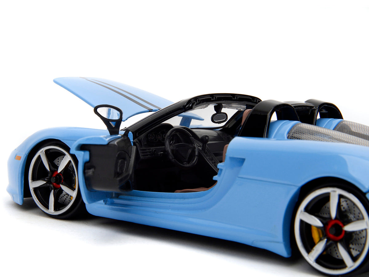 Porsche Carrera GT Convertible Blue with Black Stripes "Pink Slips" Series 1/24 Diecast Model Car