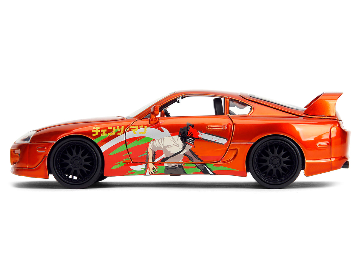 1995 Toyota Supra Orange Metallic with Graphics and Chainsaw Man Diecast Figure "Chainsaw Man" (2022) TV Series "Anime Hollywood Rides" Series 1/24 Diecast Model