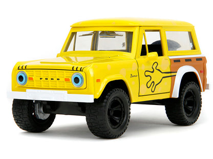 1973 Ford Bronco Yellow with Graphics and SpongeBob SquarePants Diecast Figure "SpongeBob SquarePants" (1999–Current) TV Series "Hollywood Rides" Series 1/24 Diecast Model Car