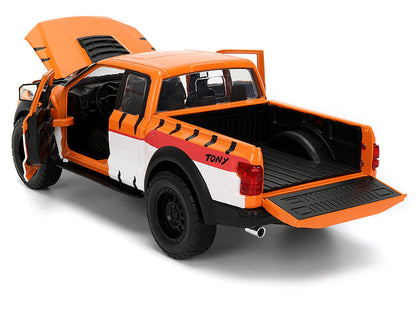 2017 Ford F-150 Raptor Pickup Truck "Frosted Flakes" Orange with Graphics and Tony the Tiger Diecast Figure "Hollywood Rides" Series 1/24 Diecast Model Car