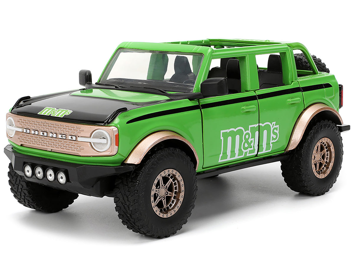 2021 Ford Bronco Green with Black Stripes and Green M&M's Diecast Figure "Hollywood Rides" Series 1/24 Diecast Model Car