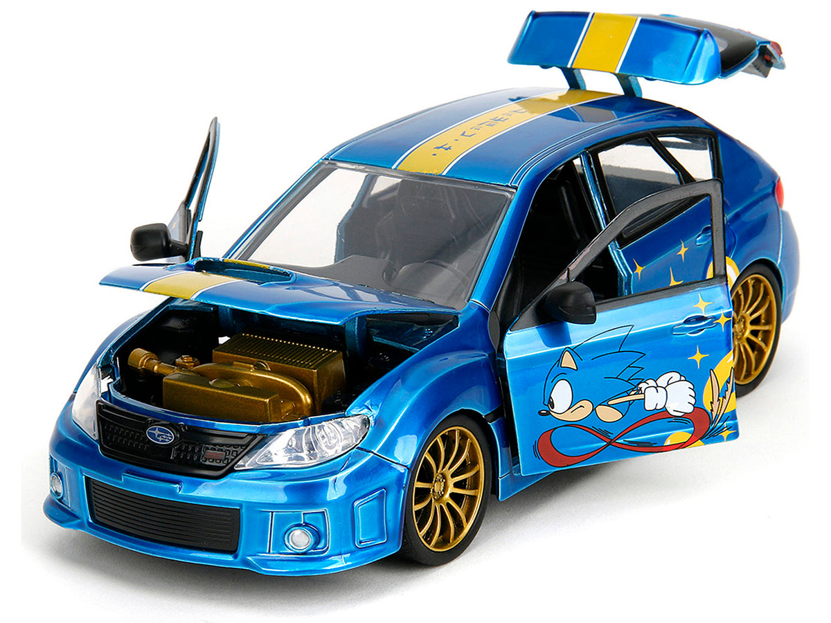 2012 Subaru Impreza WRX STI Blue Metallic with Graphics and Sonic The Hedgehog Diecast Figure "Sonic The Hedgehog" "Hollywood Rides" Series 1/24 Diecast Model Car
