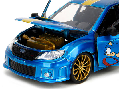 2012 Subaru Impreza WRX STI Blue Metallic with Graphics and Sonic The Hedgehog Diecast Figure "Sonic The Hedgehog" "Hollywood Rides" Series 1/24 Diecast Model Car