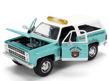 1980 Chevrolet Blazer Light Green with White Top and Graphics and Smokey Bear Diecast Figure "Smokey Bear" "Hollywood Rides" Series 1/24 Diecast Model