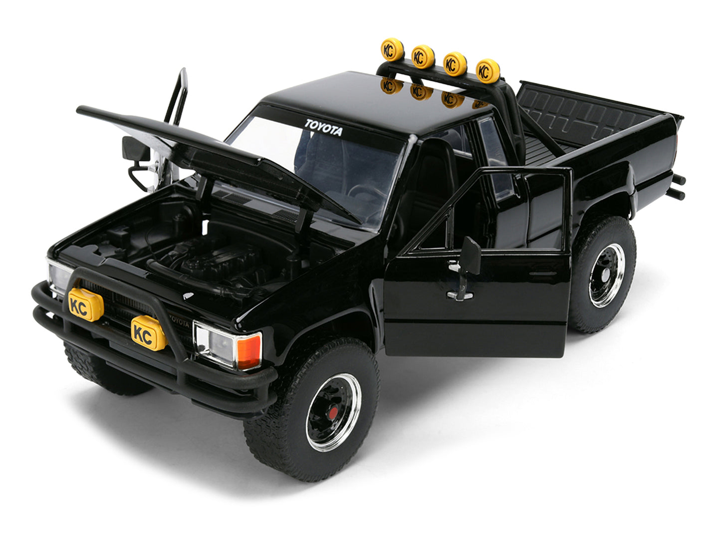 1985 Toyota SR5 Pickup Truck Black with Marty's Skateboard "Back to the Future" (1985) Movie "Hollywood Rides" Series 1/24 Diecast Model Car