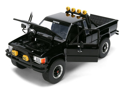 1985 Toyota SR5 Pickup Truck Black with Marty's Skateboard "Back to the Future" (1985) Movie "Hollywood Rides" Series 1/24 Diecast Model Car