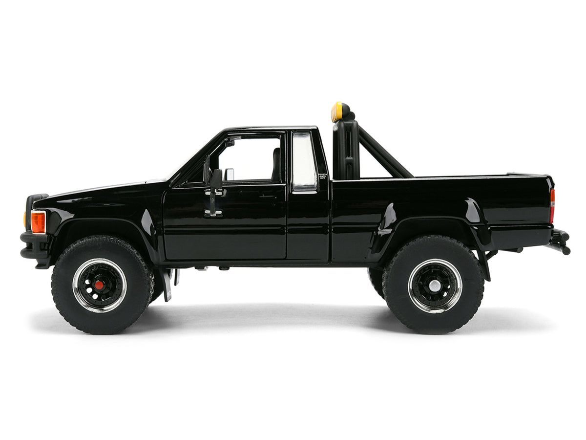1985 Toyota SR5 Pickup Truck Black with Marty's Skateboard "Back to the Future" (1985) Movie "Hollywood Rides" Series 1/24 Diecast Model Car