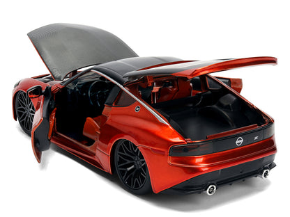 2023 Nissan Z Orange Metallic with Carbon Hood and Black Top "JDM Tuners" Series 1/24 Diecast Model Car
