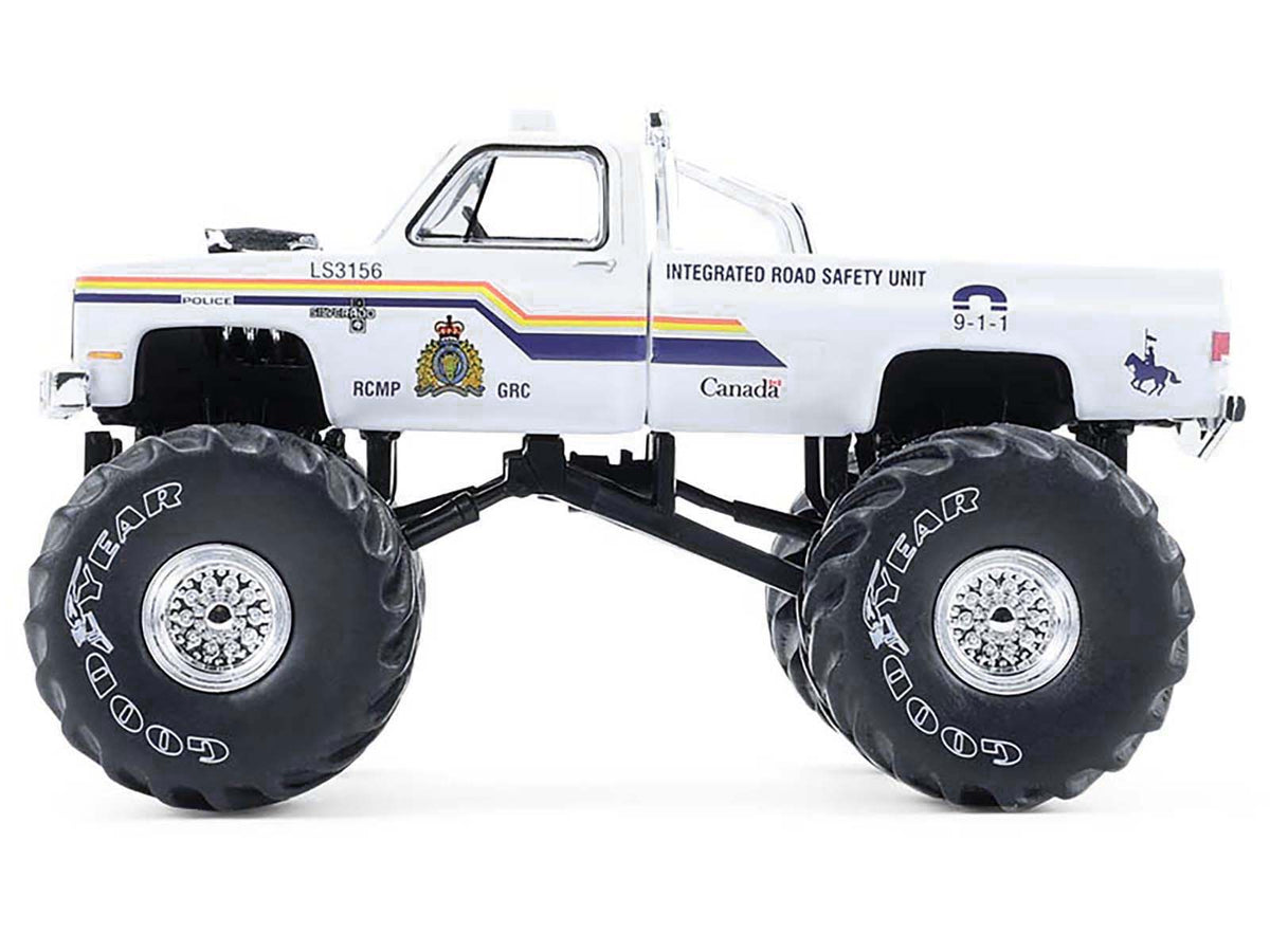 1986 Chevrolet Silverado Monster Truck "Royal Canadian Mounted Police" White with Stripes "Kings of Crunch - Hot Pursuit" Special Edition 1/64 Diecast Model Car